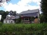 Łomnica, ruiny szachulcowego dworu Opitzów.