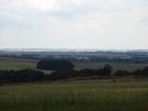 Wyszliśmy z lasu na łąkę, zrobiliśmy przerwę mając przed sobą rozległą panoramę.