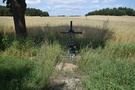 Przydrożna mogiła Józefa Sawickiego z Wyłudek.